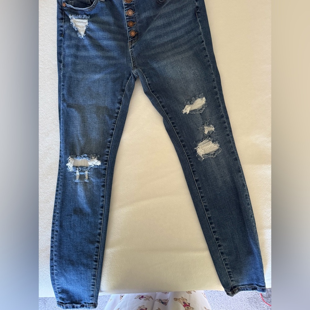 Judy Blue Button-Fly Jeans with Thermal weave Insets in the rips!